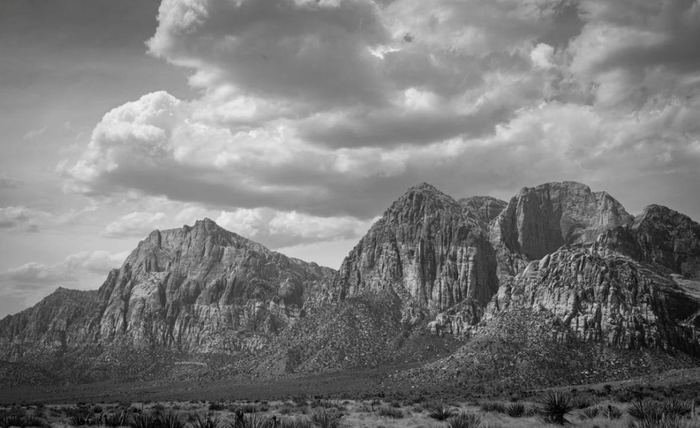 Storm clouds over the peaks of Red Rock Canyon, black and white